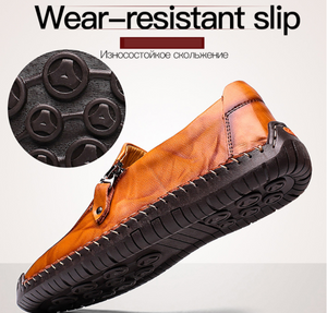 Zapatos de cuero con cremallera y pespuntes a mano slip on para hombres y mujeres